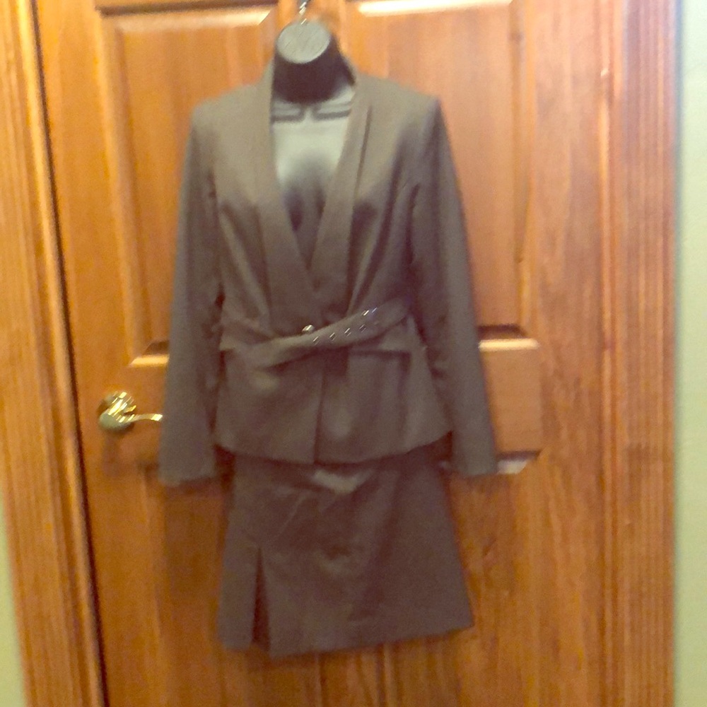 Brown skirt suit.